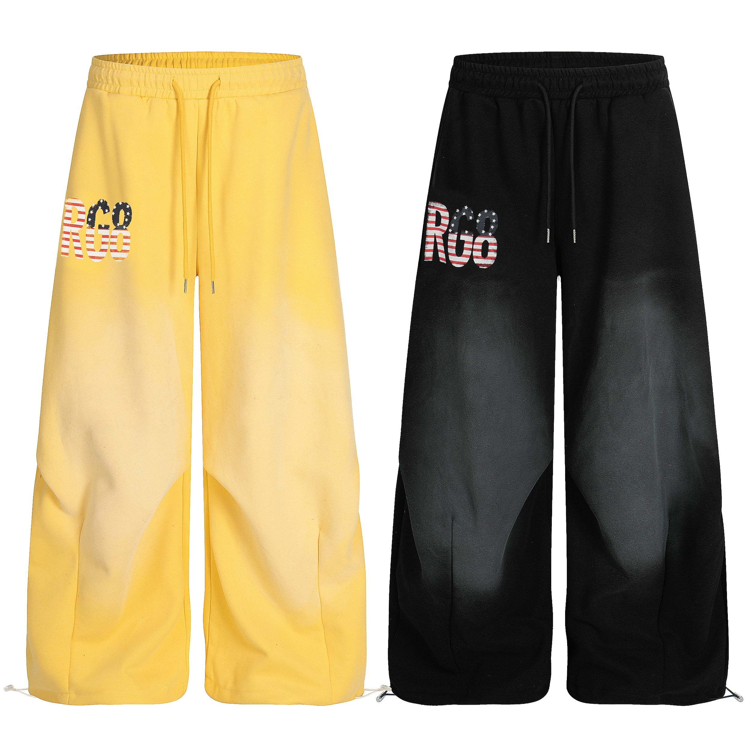 Omirad wide-leg sweatpants in yellow and black with gradient spray effect and Americana RG8 graphic logo