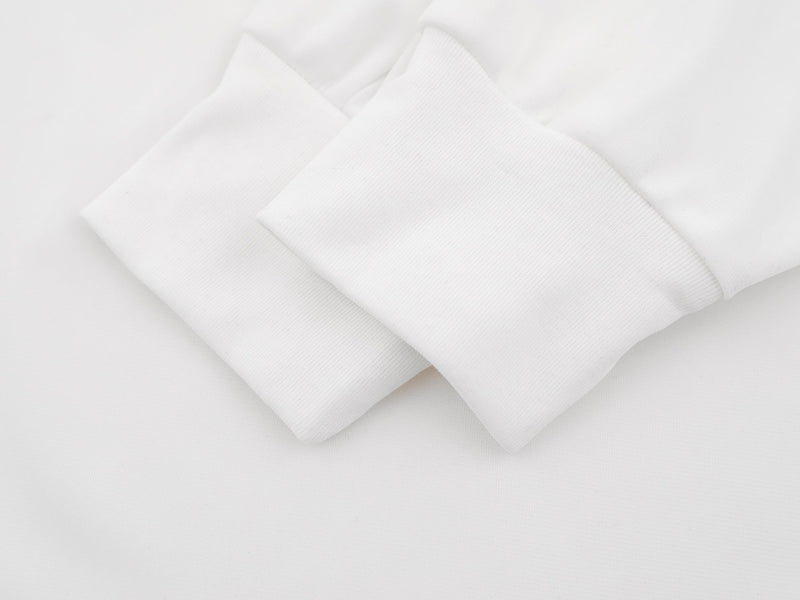 Close-up of white sleeve cuff on jersey