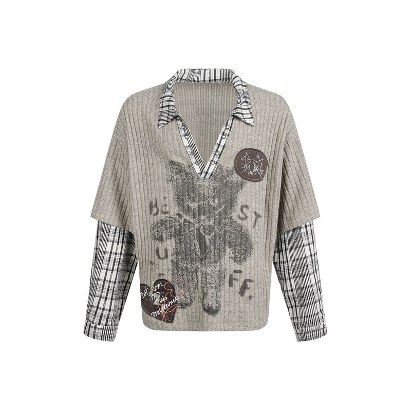 Beige ribbed knit sweater with plaid collar, layered sleeves, and bear graphic front view