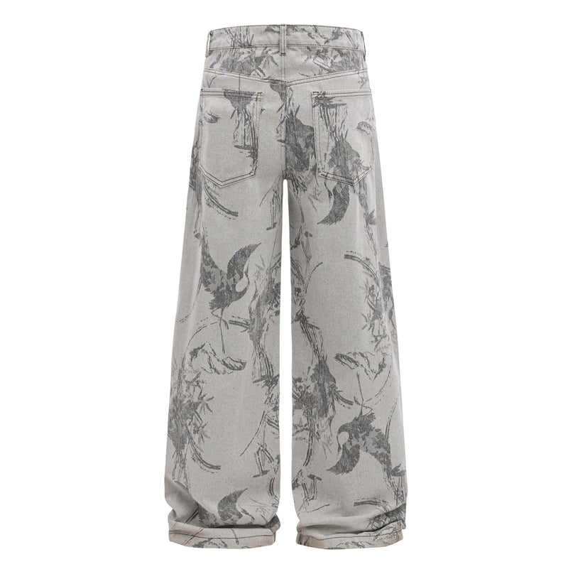 Back view of gray wide-leg jeans with abstract ink-wash print and back pockets