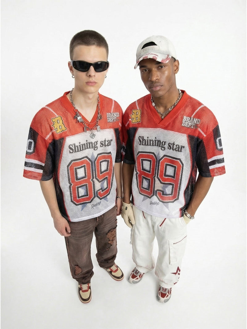 Two models wearing red mesh Shining Star 89 football jersey T-shirts in a streetwear style on a white background