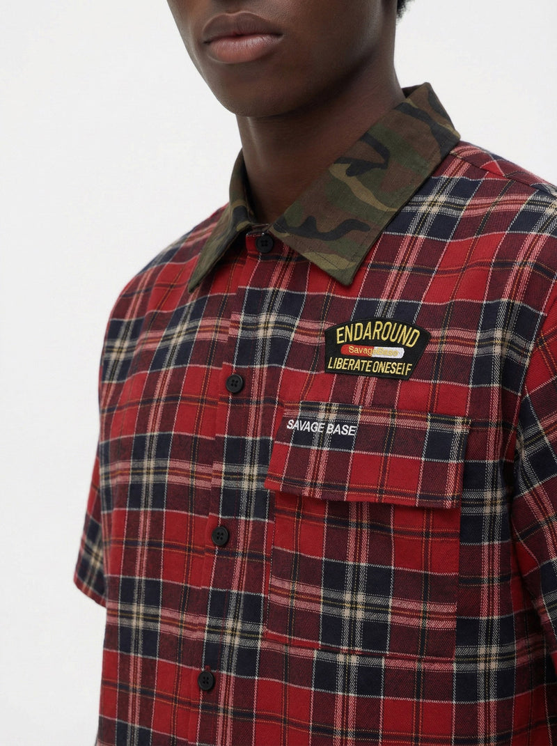 Red plaid button-up shirt with camouflage collar, chest pocket, and Savage Base streetwear patches