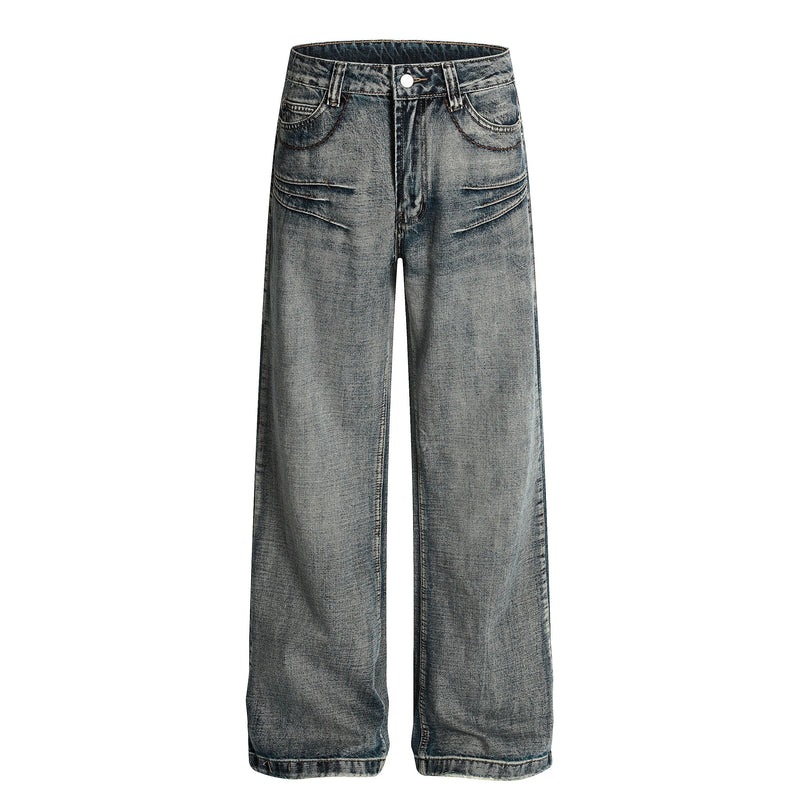 Front view of vintage wash wide-leg denim jeans with creased legs and curved front pockets