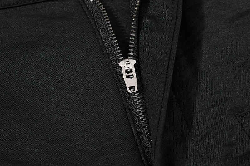 Close-up of black pants zipper fly with metal zipper pull