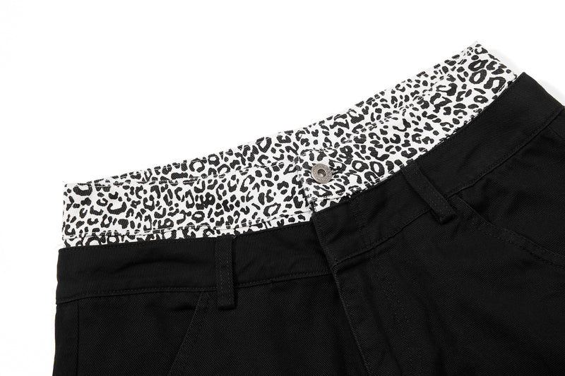 Leopard-print waistband with button closure and black cargo pants waistband detail
