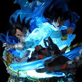 Two animated characters with spiky black hair strike an action pose surrounded by swirling blue energy and debris, their expressions fierce and dynamic. This glowing effect mirrors the Goku Transformations Collectible Figure – Dragon Ball Super by Seakoff, 46cm with interchangeable heads.