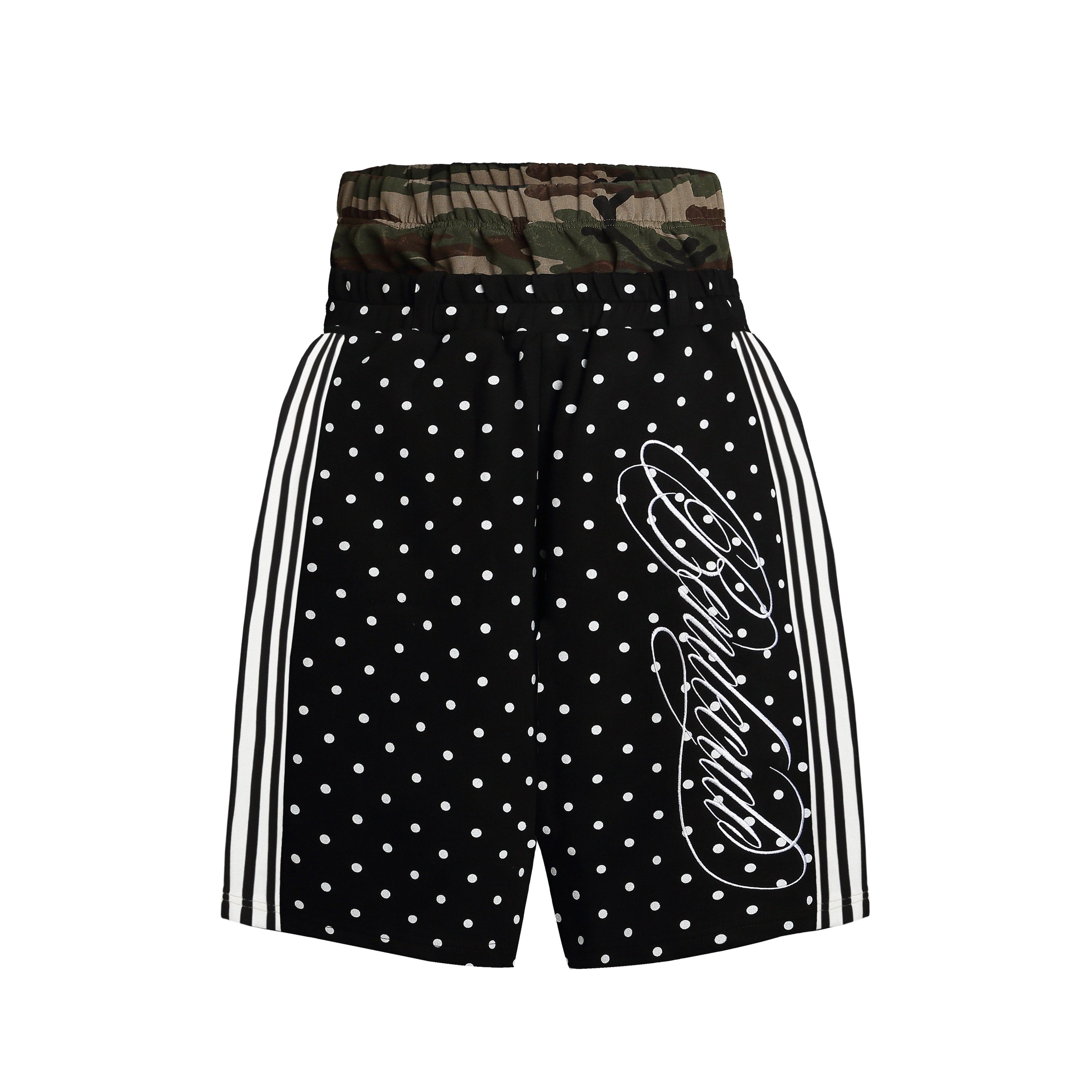 Black polka dot shorts with woodland camo elasticated waistband, white side stripes, and cursive logo print on front panel