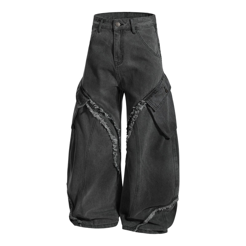 Front view of black washed cargo jeans with wide legs and frayed curved panel seams