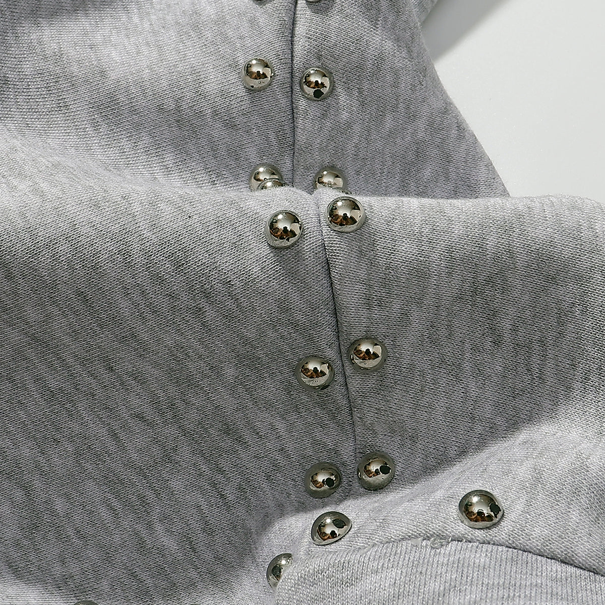 Omirad Studded Arc Zip Hoodie | Metal Stud Detail Streetwear