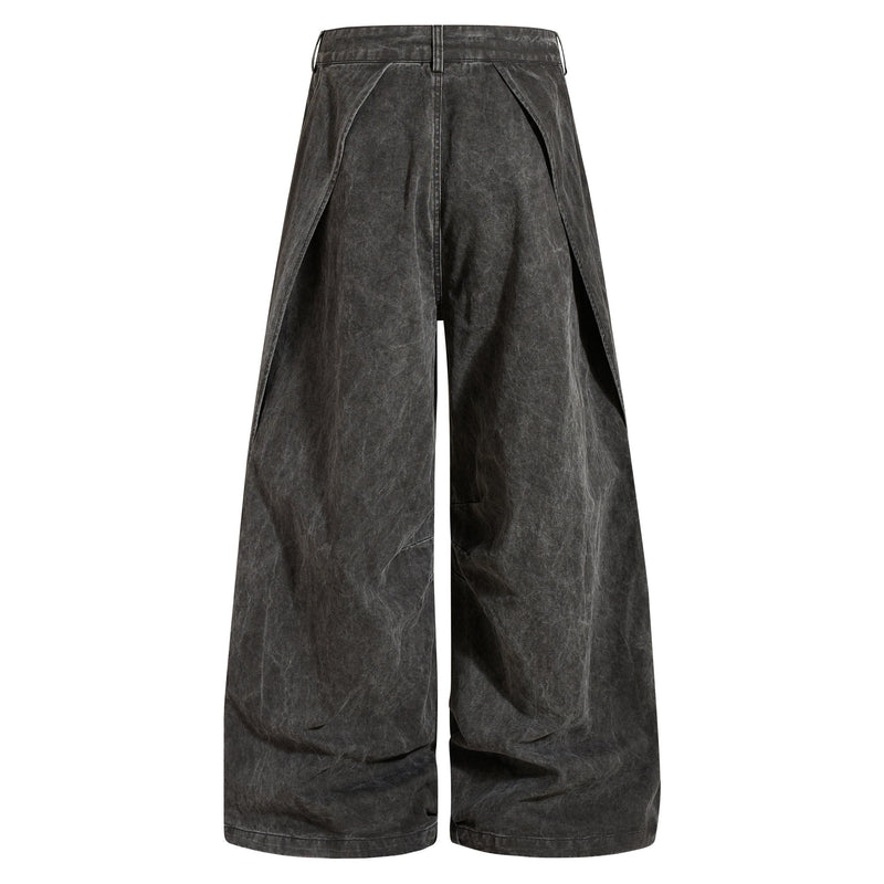 Dark charcoal washed denim jeans back view with oversized wide legs and back seam details