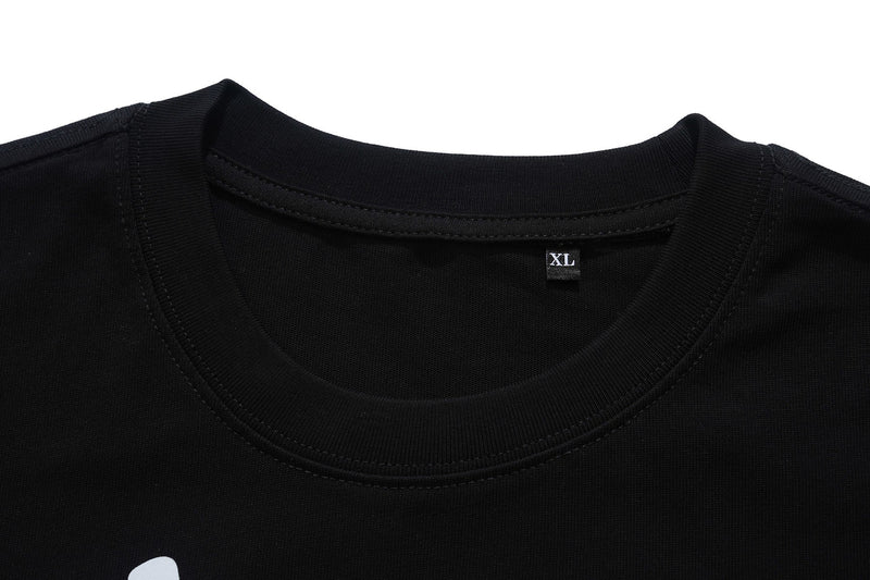 Black crew neck graphic tee with stitched collar and XL size tag on a white background