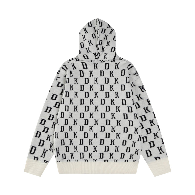 Back view of white knit zip hoodie with allover black monogram pattern and cream ribbed hem