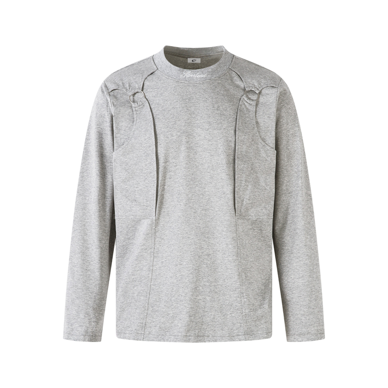 Light gray long sleeve tee with structured panel seams and metal ring details at the chest