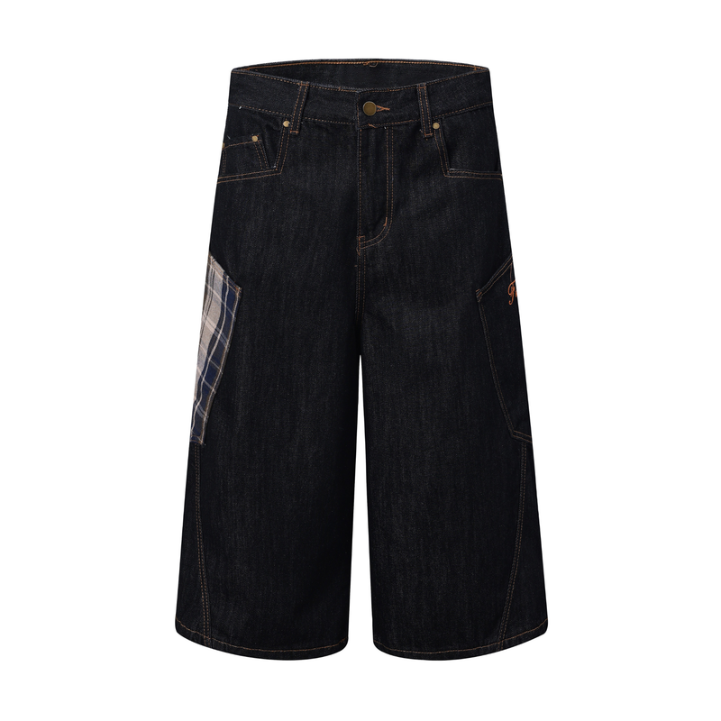 Front view of dark indigo wide-leg denim jorts with plaid side patch and copper topstitching