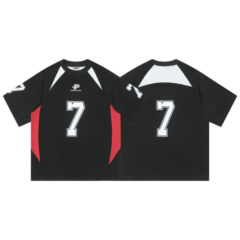 Black varsity jersey tee with white number 7, red side panels, and colorblock raglan sleeves front and back