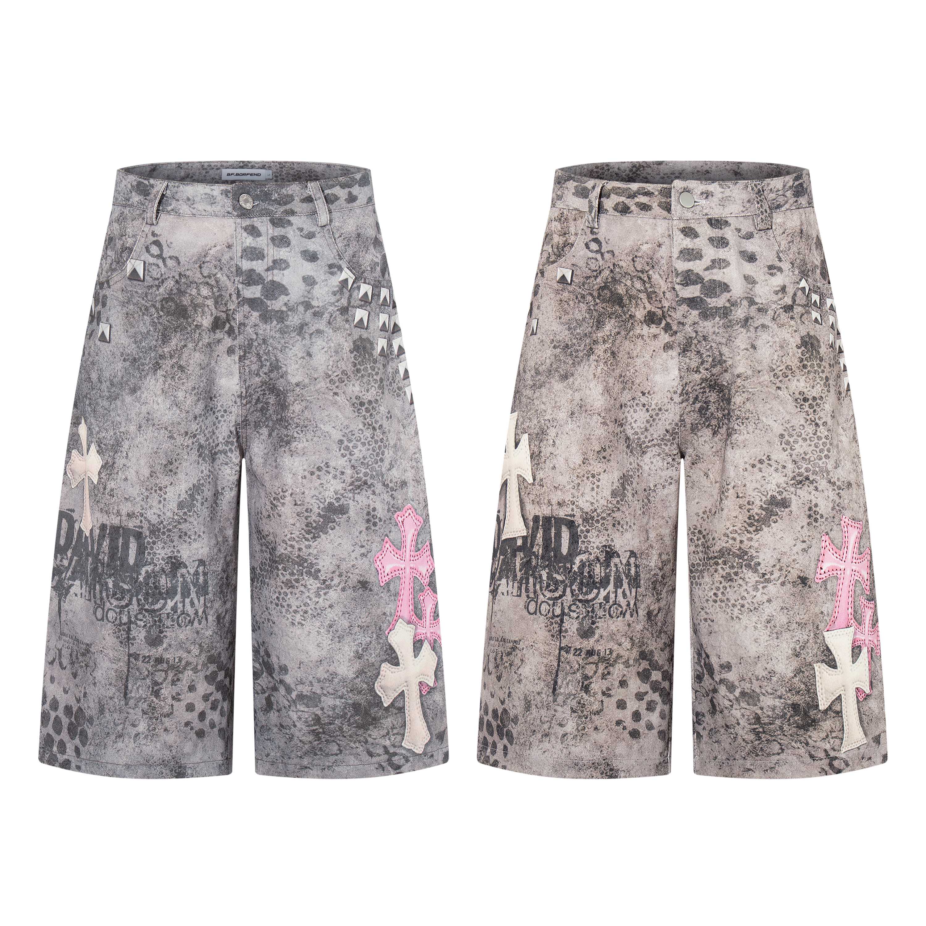 Grey washed denim shorts with cross patches, pyramid studs and grunge print, shown in two colorway variations