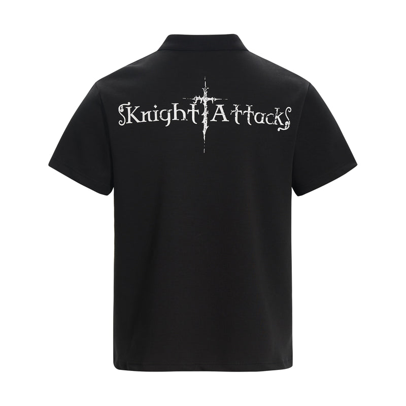 Black polo tee with white Knight Attack gothic graphic on the back, featuring a medieval-inspired streetwear design