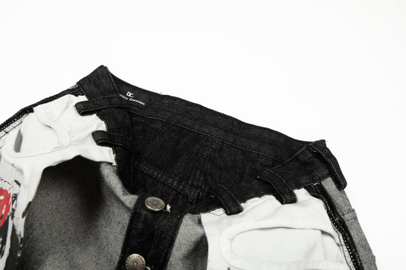 Close-up of black waistband, belt loops, and contrast patch pocket trim on jeans