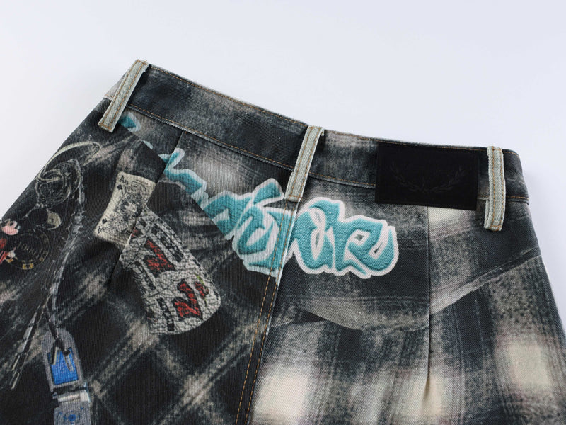 Upper back waistband of patchwork jeans with graffiti-style print, belt loops and black label patch