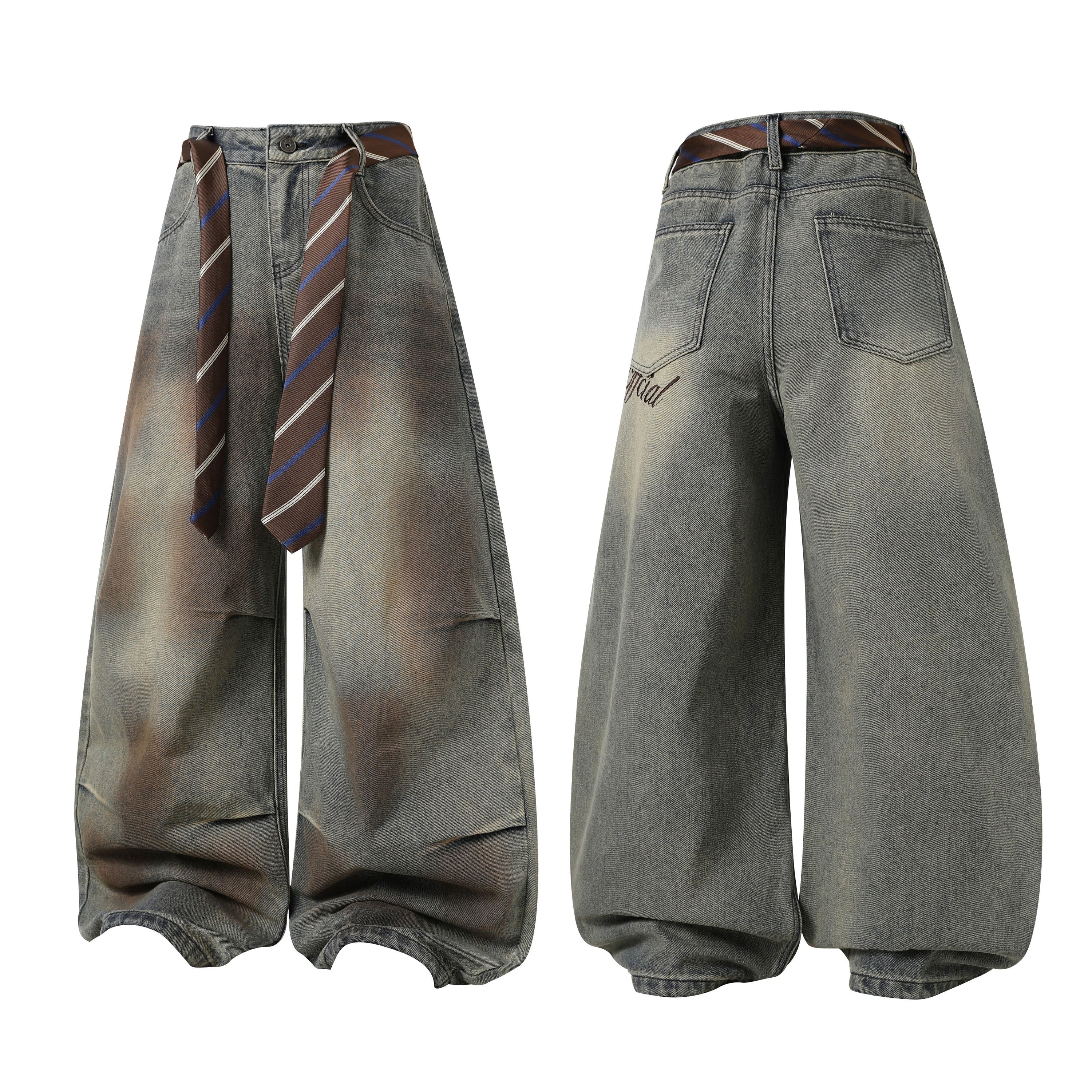 Front and back view of wide-leg vintage wash denim pants with striped tie waistband detail and script embroidery