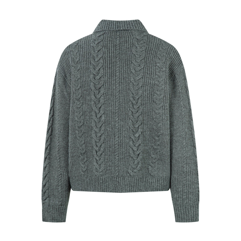 Back view of dark gray cable knit sweater jacket with ribbed collar and textured knit