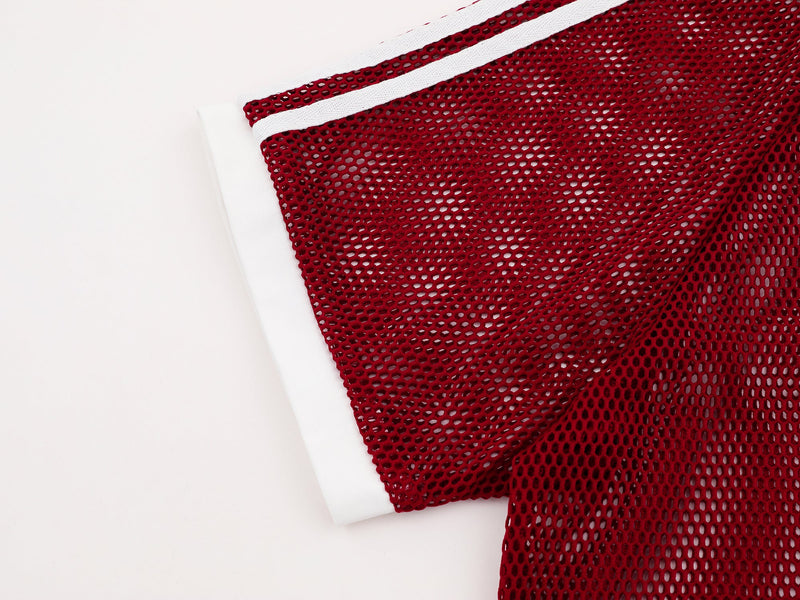 Red mesh vintage polo tee with white trim, shown in a close-up fabric detail on a clean white background