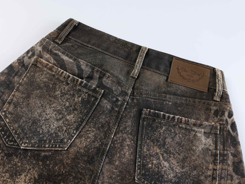 Back waistband and pocket detail on dark brown animal print jeans