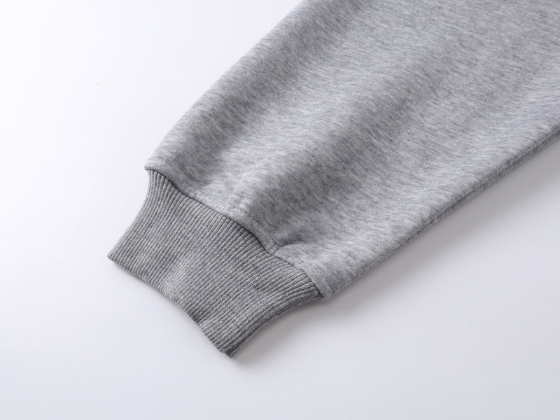 Gray hoodie sleeve cuff detail with ribbed knit wrist trim
