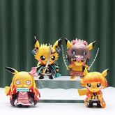 The Demon Slayer Pikachu 4-piece set features 9cm Cosplay Pikachu action figures styled as characters from "Demon Slayer: Kimetsu no Yaiba," displayed on a tiered stand against a dark green curtain. Each figure uniquely resembles iconic anime characters.