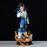 This 55cm Seakoff Vegeta Collectible Figure from Dragon Ball Z showcases the iconic character in Super Saiyan, Super Saiyan Blue, and Normal forms with spiky hair, featuring blue energy effects on a rocky base.