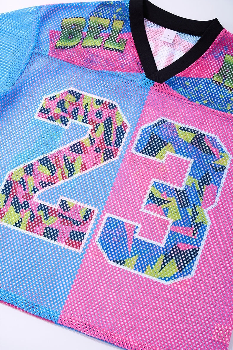 Colorful split mesh jersey T-shirt with oversized number 23 in blue, pink, black, and neon camo print