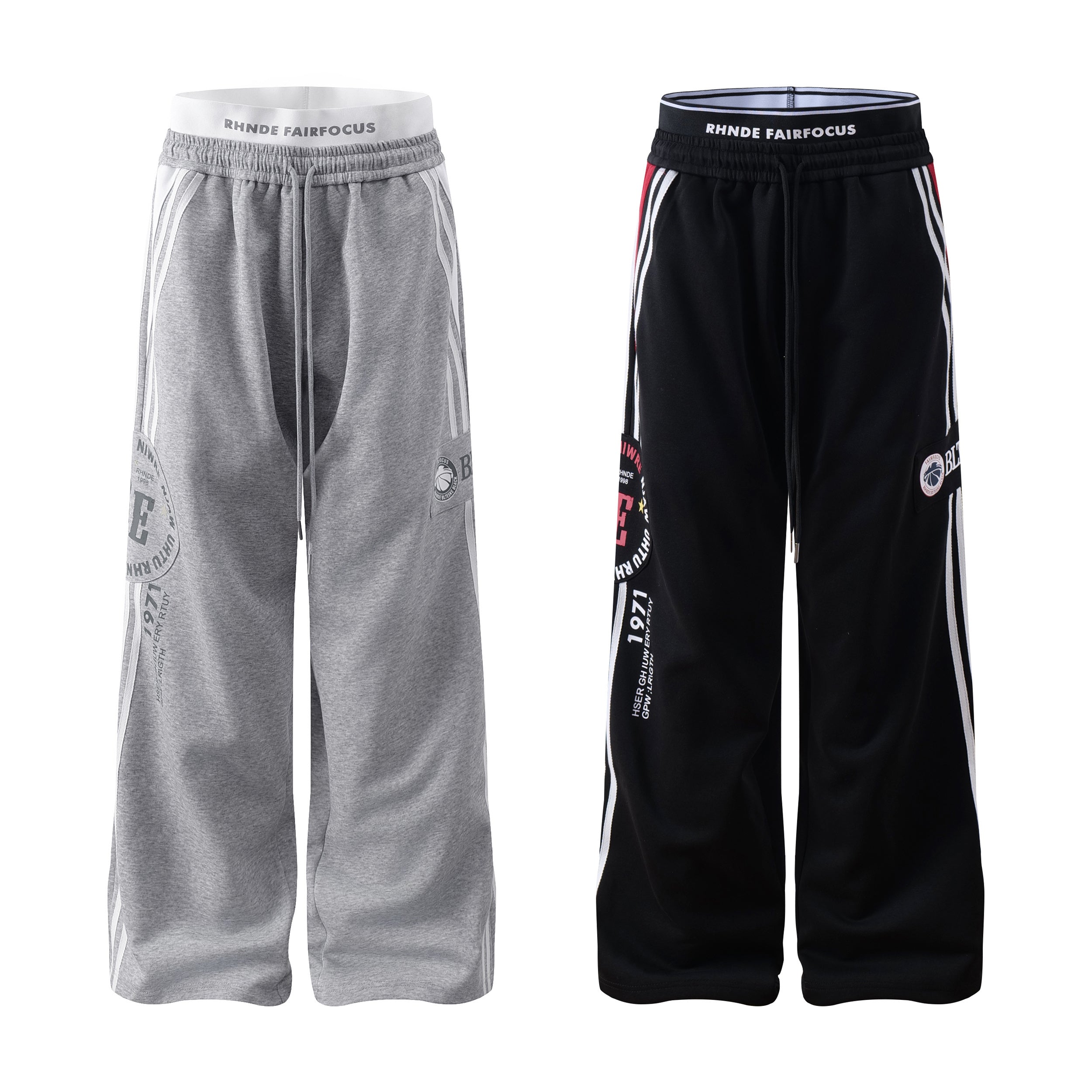 Heather grey and black wide-leg college track pants with RHNDE FAIRFOCUS waistband, side stripes, and collegiate graphic prin