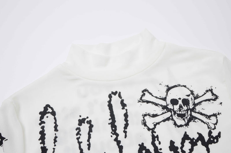 Close-up of white top neckline with skull and distressed black print