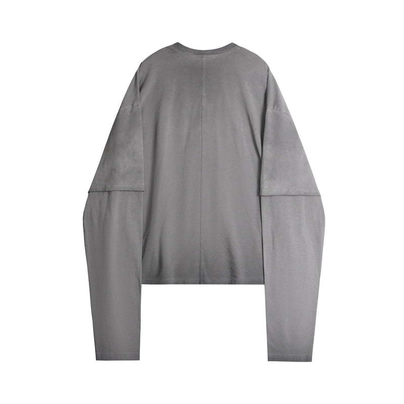 Washed grey long sleeve tee shown from the back with layered sleeves and center seam