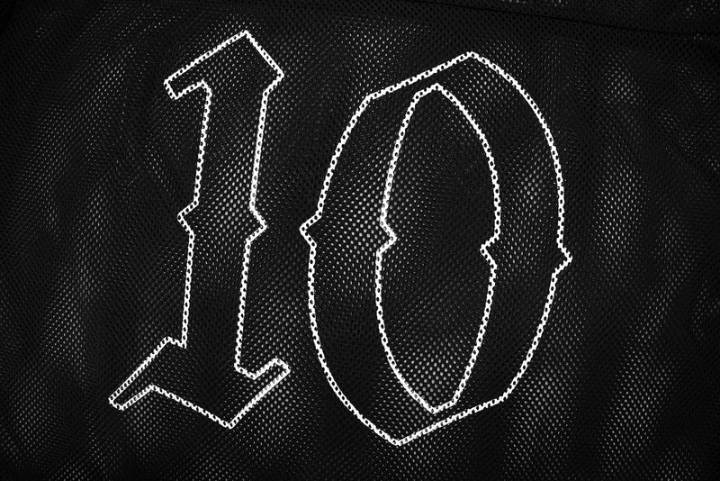 Black mesh streetwear jersey with bold white number 10 graphic and gothic-style detailing