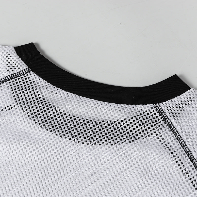 Close-up of a white mesh varsity jersey with black ribbed collar and visible stitched seams, breathable athletic streetwear top
