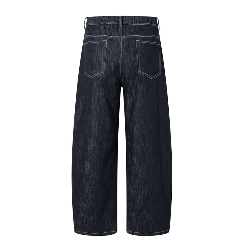 Back view of dark denim wide-leg jeans with patch pockets and contrast topstitching
