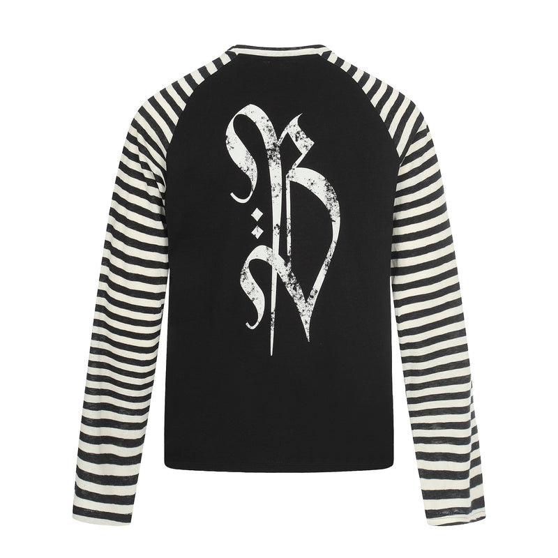Back of black raglan tee with cream striped sleeves and white gothic cross graphic