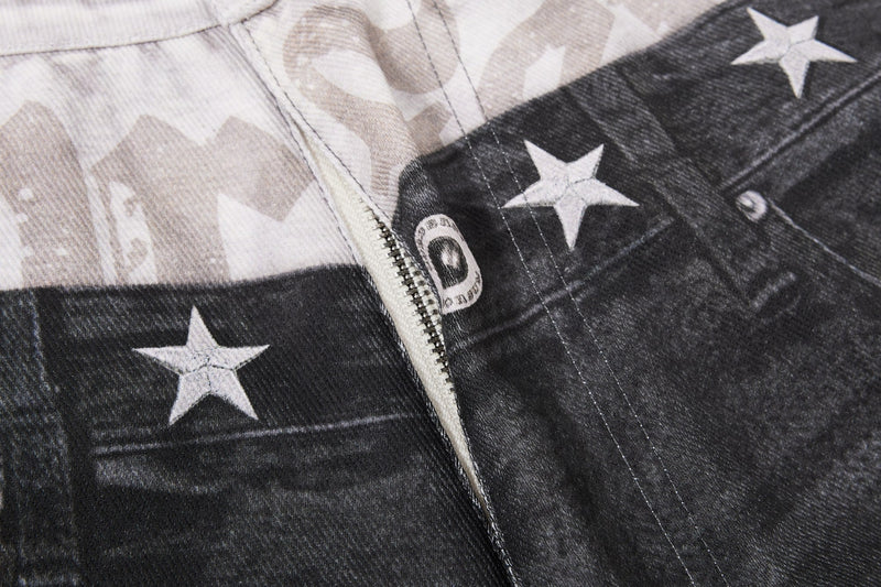 Close-up of layered waistband seam with zipper, star print and button details