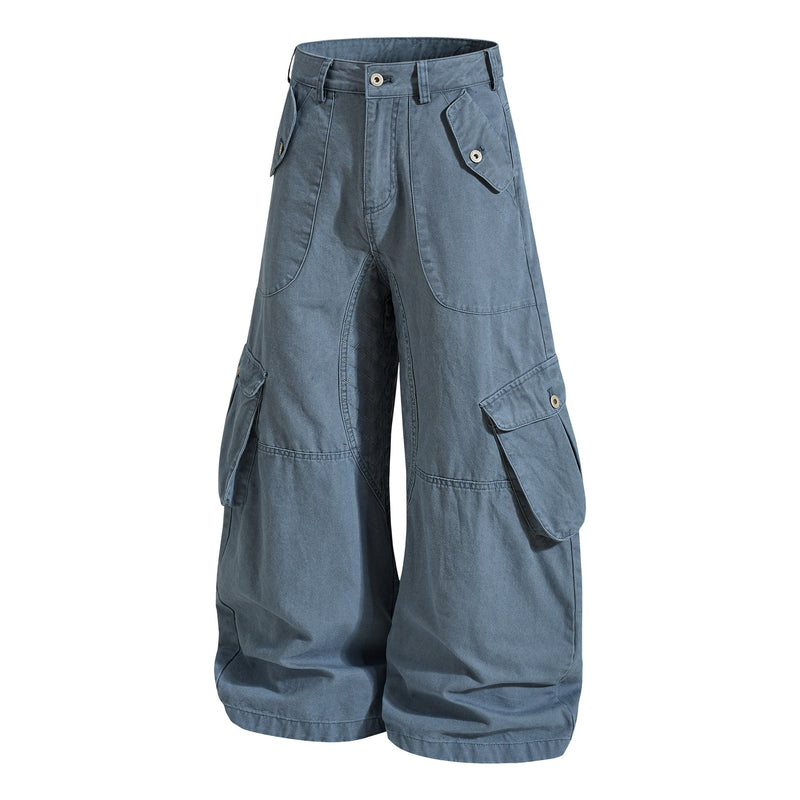 Blue cargo pants front view with quilted inner leg panel and flap pockets