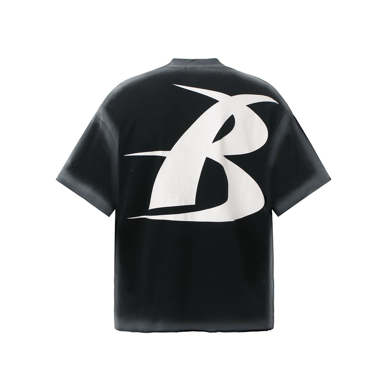Black oversized streetwear tee with a large white abstract slogan graphic on the back