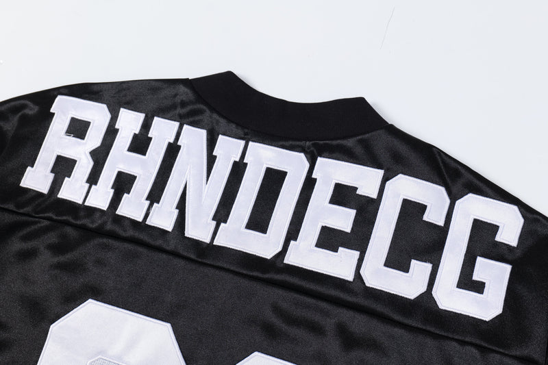 Black mesh football jersey with white varsity letters and number 02 on the back neckline