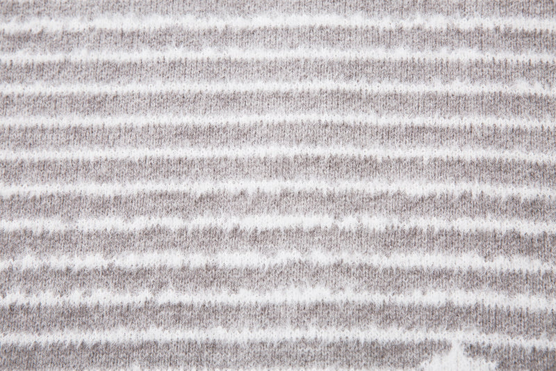 Close-up of the gray striped knit fabric with horizontal white lines