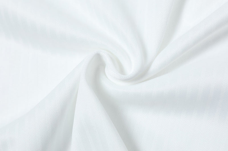 White textured sports jersey fabric with a smooth, lightweight finish for a streetwear soccer tee