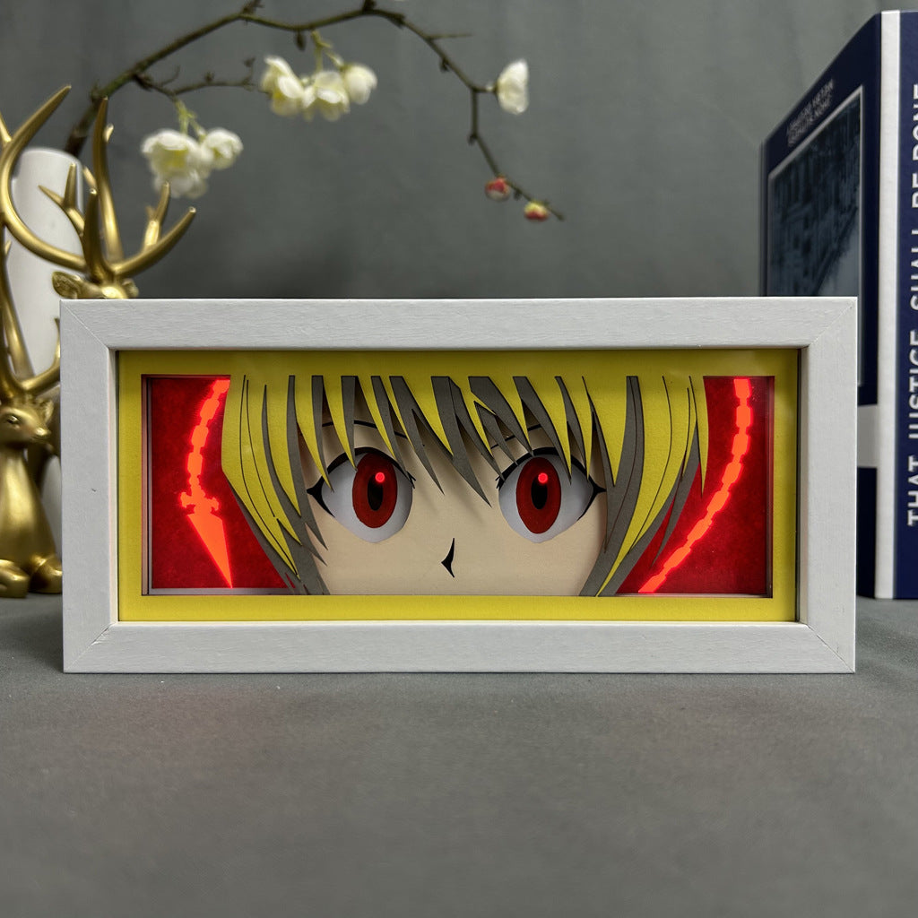 The Hunter x Hunter Anime Light Box showcases Kurapika with scarlet eyes and a chain theme, featuring a vivid 3D design with decorative elements like an antler sculpture and hanging white flowers. It includes a 16-color LED light for enhanced atmosphere.