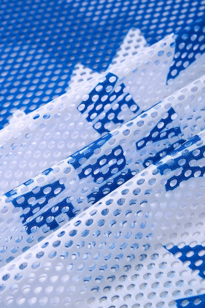 Close-up of blue and white perforated mesh fabric on a Seakoff Maple 26 varsity jersey T-shirt