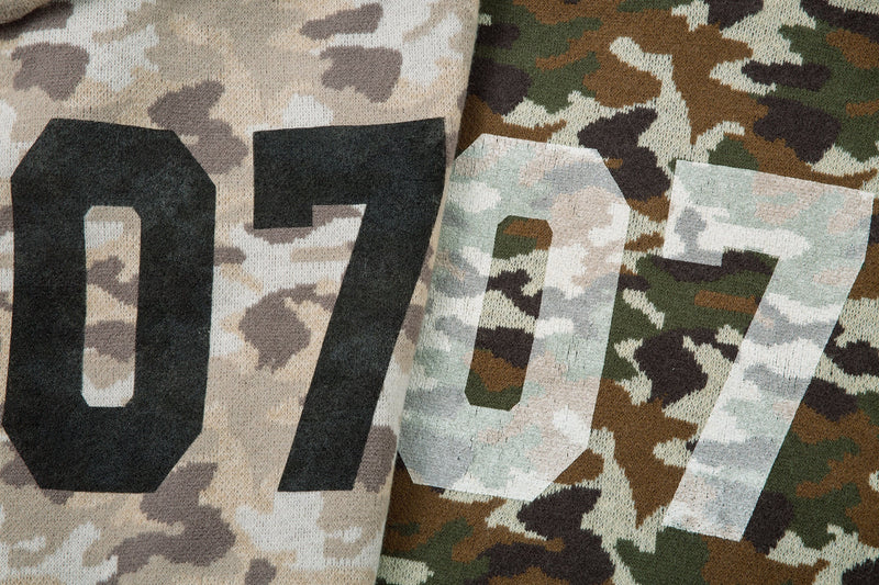 Side-by-side close-up of beige and olive camouflage 07 graphics on knit fabric