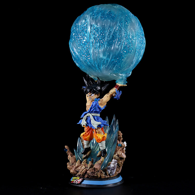 The Seakoff Goku Collectible Figure – Dragon Ball Z Kamehameha Statue showcases Goku with spiky black hair in his classic orange-blue outfit, dramatically poised on a rocky base with a textured blue sphere overhead, capturing the essence of the Kamehameha wave.