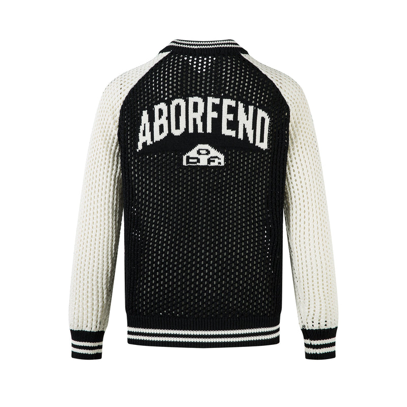 Back view of black and cream mesh knit jacket with arched logo lettering