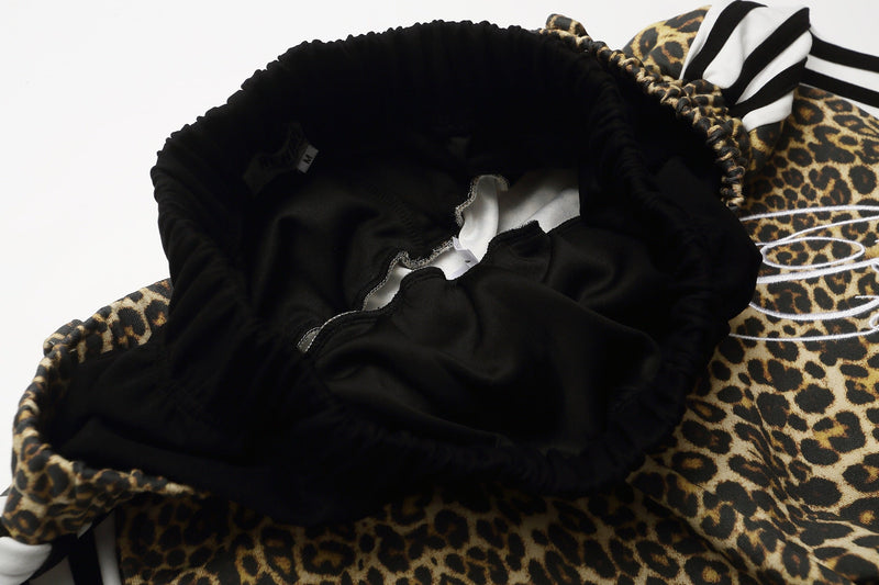 Close-up of elastic waistband interior and top opening of the leopard print shorts